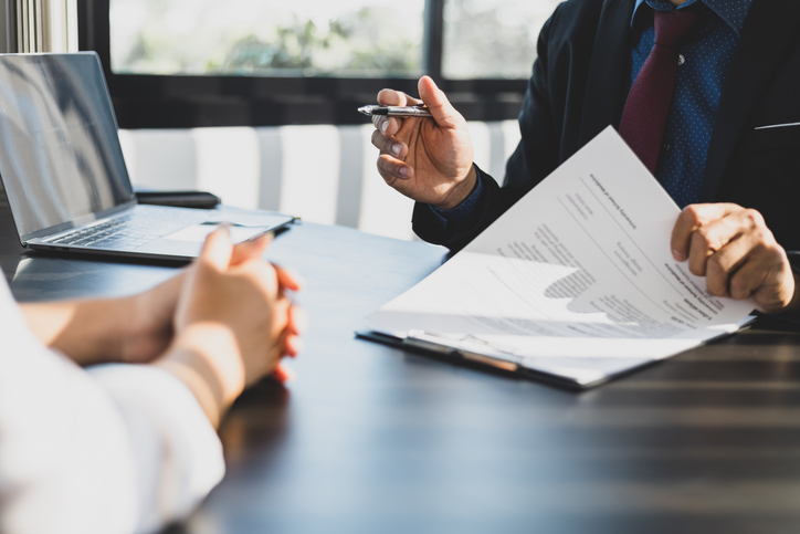 A client reviewing an annuity contract with a financial advisor.